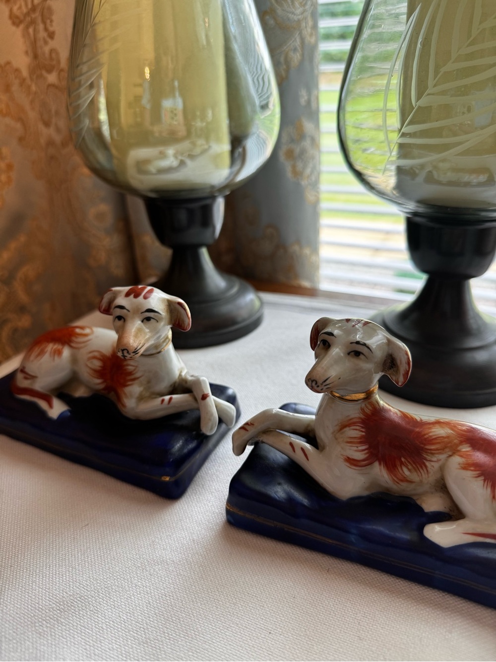 Porcelain Pair of White and Rust Accent Dogs on Blue Bases-Jordan Stout 1897